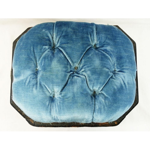 212 - A late Victorian crossbanded footstool/sewing box, the hinged blue velvet top opening to reveal a bl... 