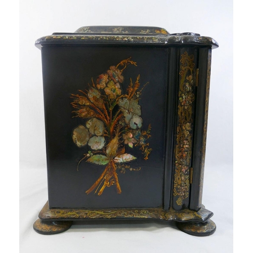 213 - A Victorian papier maché table top cabinet, inlaid with mother of pearl and decorated in gilt, the h... 