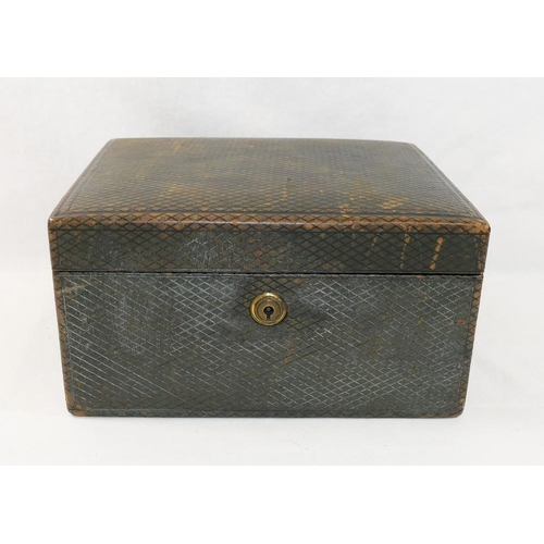 218 - A green Moroccan leather bound jewellery box with velvet lined interior and having two fitted trays