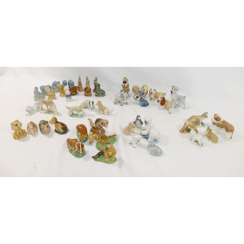 227 - A large collection of approximately 130 Wade Whimsie figures, with several sets and examples from th... 