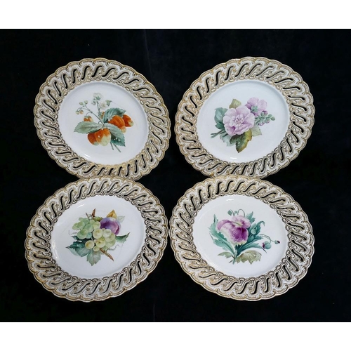 246 - A set of four Coalport dessert plates, with gilt decorated pierced rim and hand painted with fruit a... 