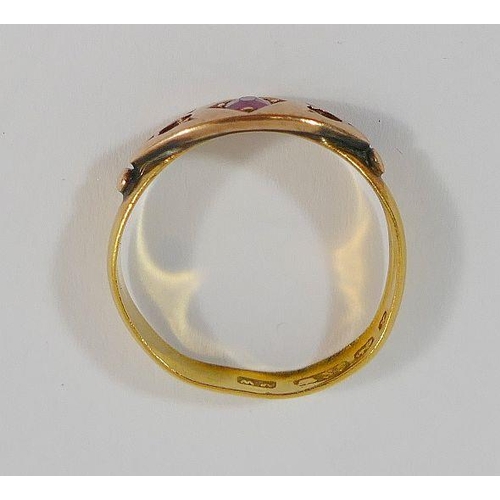 25 - A 22 carat gold wedding band, Birmingham 1897, mounted with rose gold ring head set with a single ga... 