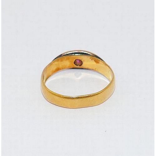 25 - A 22 carat gold wedding band, Birmingham 1897, mounted with rose gold ring head set with a single ga... 