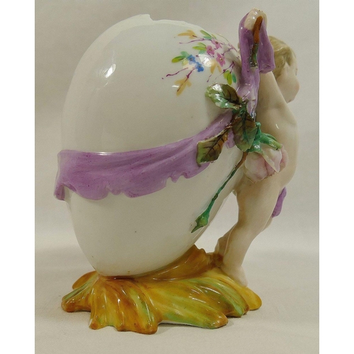 252 - A late 19th century KPM Krister porcelain vase in the form of an eggshell with cherub, 10.5cm high, ... 