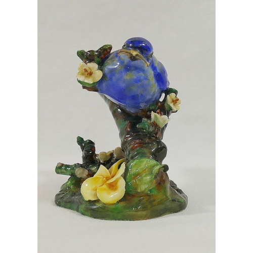 253 - A Royal Doulton bone china figure of a fledgling chick perched on a blossom covered branch, 7cm high... 