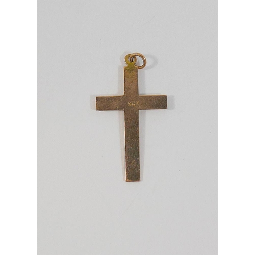 27 - A yellow metal cross pendant, with engine turned decoration, stamped 9CT, 4.7cm long, 1.8g