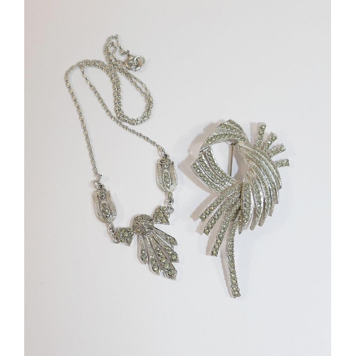 28 - Three vintage marcasite set jewellery items comprised of a necklace, a marcasite and enamel horse br... 