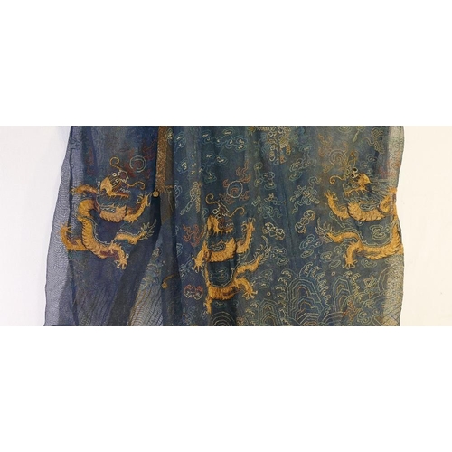 281 - A Chinese late Qing dynasty summer gauze dragon robe (Jifu), the fine blue mesh-like fabric embroide... 