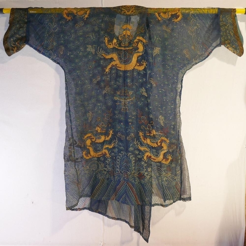 281 - A Chinese late Qing dynasty summer gauze dragon robe (Jifu), the fine blue mesh-like fabric embroide... 