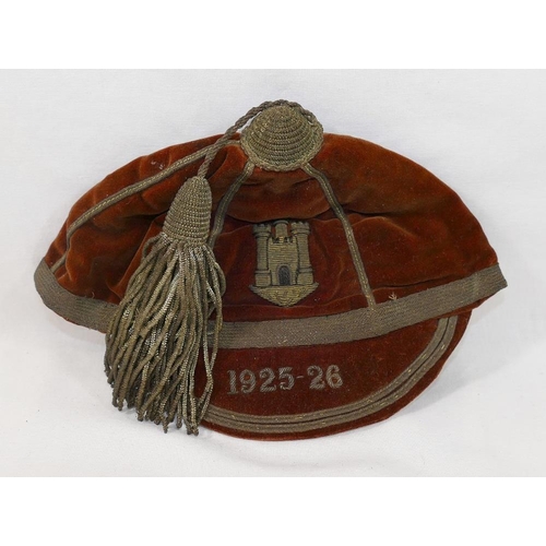 282 - A 1926 brown velvet and embroidered sporting cap (rugby/cricket etc) with three turret castle coat o... 