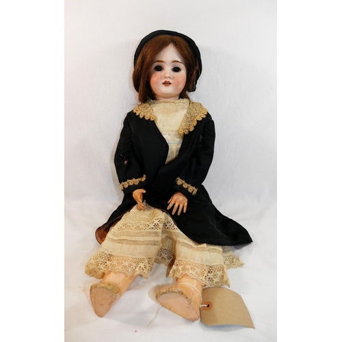 288 - A Schoenau & Hoffmeister early 20th century bisque socket head doll, with brown glass sleeping eyes,... 