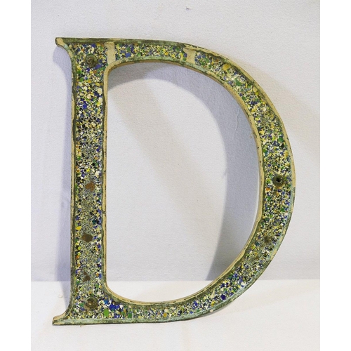 318 - A vintage enamelled initial 'D', the cast iron letter with green enamelled front and mottled enamell... 