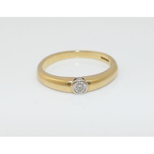 59 - An 18 carat gold diamond single stone ring, the round brilliant cut stone approximately 0.13 carats,... 