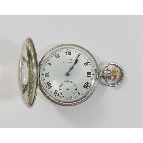 68 - A Pinnacle silver cased stem wind half hunter pocket watch, the Dennison case Birmingham 1924 with i... 