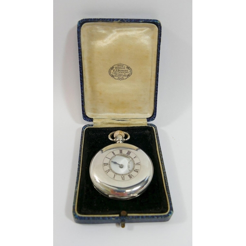 68 - A Pinnacle silver cased stem wind half hunter pocket watch, the Dennison case Birmingham 1924 with i... 