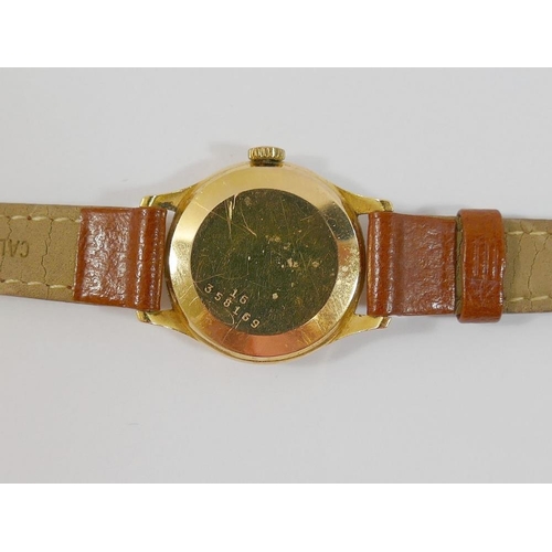 72 - An 18 carat gold cased ladies Fischer Extra wrist watch, with leather strap and 17 jewel movement, t... 