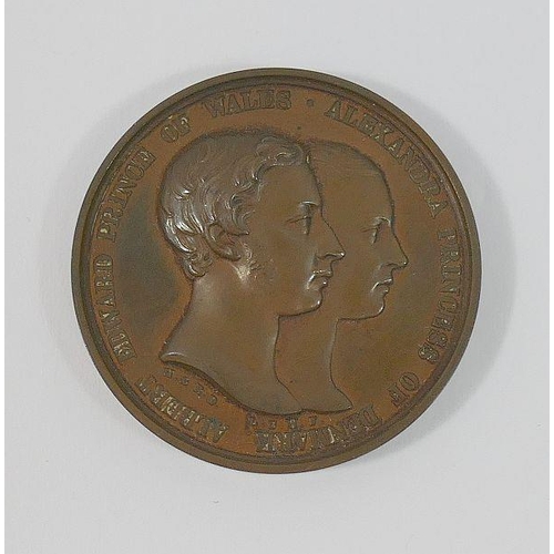 82 - A bronze commemorative coin celebrating the wedding of Albert Prince of Wales with Alexandria Prince... 