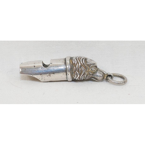 90 - An Edwardian novelty silver dog whistle, Chester 1904, the base of the whistle in the form of a span... 