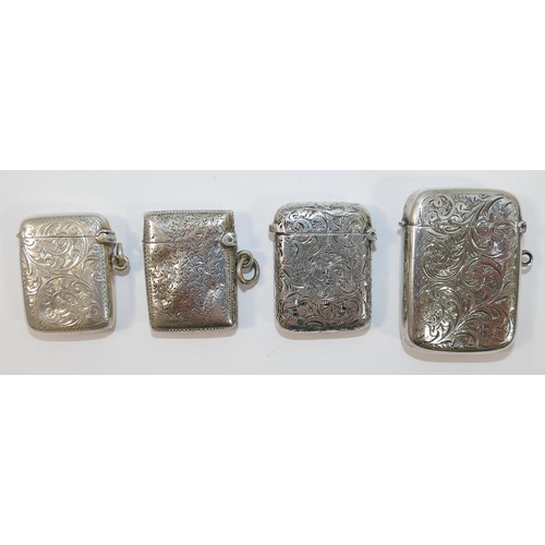 92 - Four Victorian and later silver vesta cases, all with engraved design, hinged lids and strikes to th... 