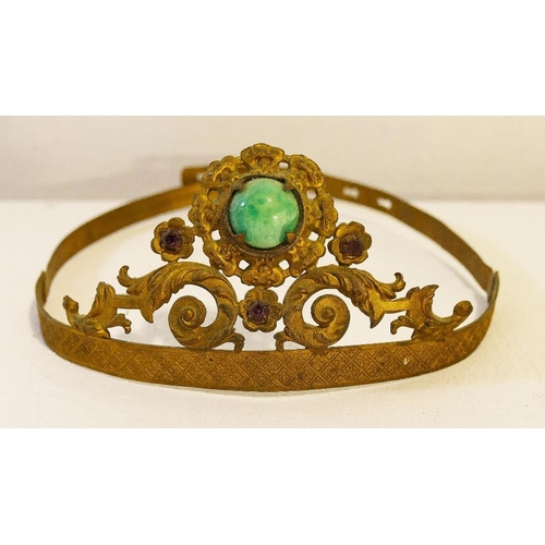 98 - A gilt metal crown, with scrolling acanthus leaves and set with coloured paste 'gems', a gilt metal ... 