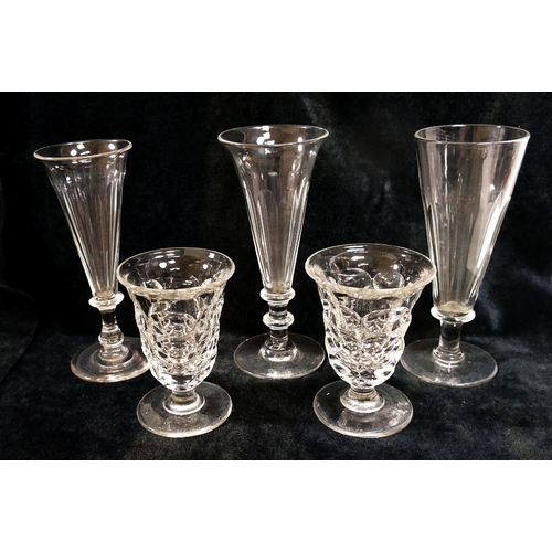 132 - A collection of approximately 27 19th century and later drinking glasses, most with panel cut decora... 