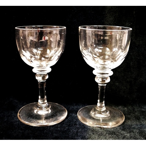 132 - A collection of approximately 27 19th century and later drinking glasses, most with panel cut decora... 