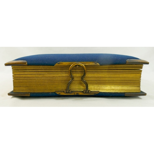 296A - A Victorian blue cloth and brass bound photograph album, complete with photos