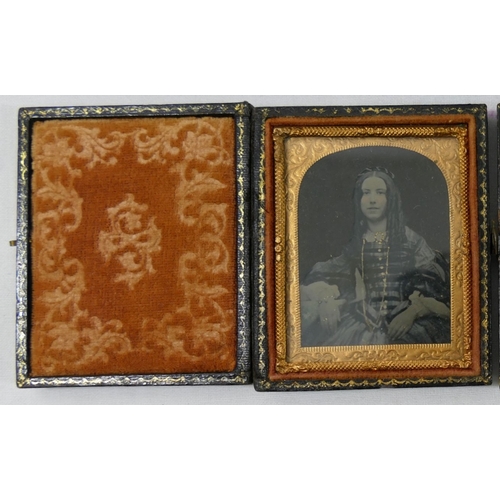 319A - Five 19th century ambrotypes featuring women and each housed within gilt metal mount and velvet surr... 