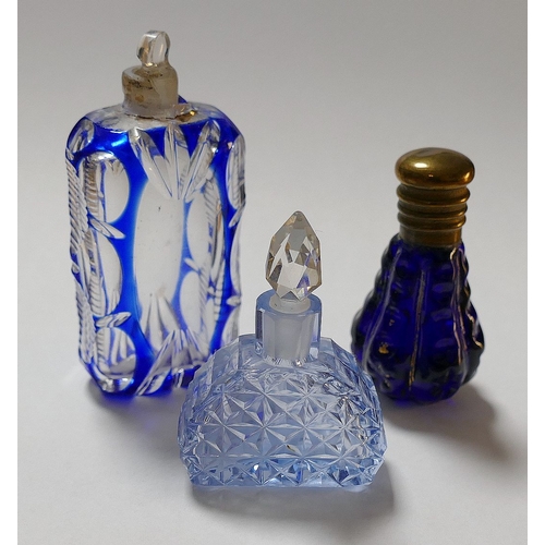 89A - A collection of eight 19th century scent bottles, comprised of a silver topped panelled glass exampl... 