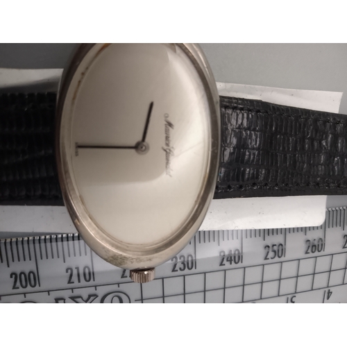46 - vintage Maurice Guerdat watch, specifically a 1970s model featuring a distinctive oval-shaped case, ... 