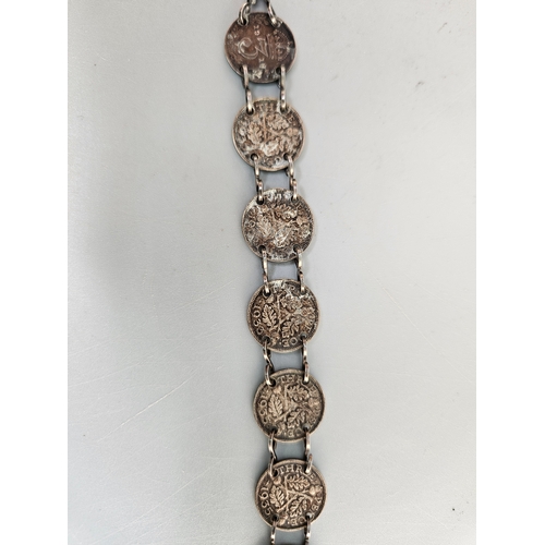 49 - VINTAGE SILVER 3 PENCE COIN SWEETHEART BRACELET
gross weight 12.5g