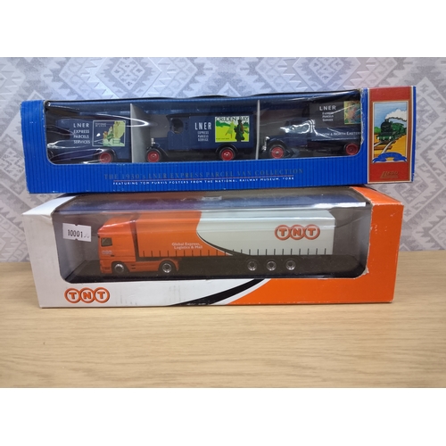 130 - Corgi TNT lorry and 3 cars in boxes