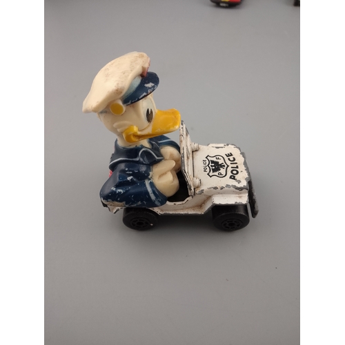 145 - Vintage Walt Disney series Matchbox cars etc bugs bunny noddy mickey mouse