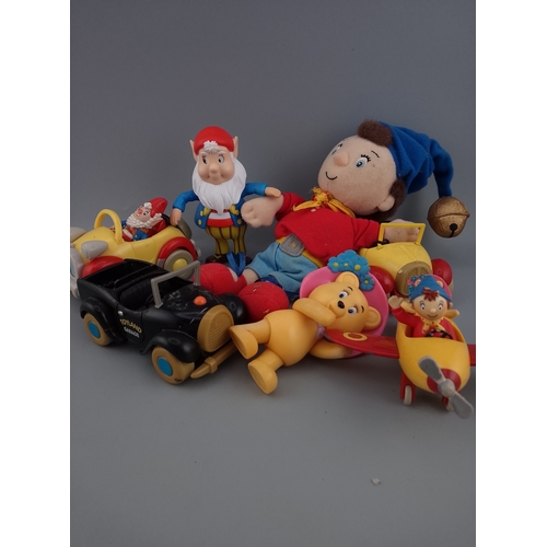 148 - A collection of vintage Noddy characters and vehicles, including plush toys and plastic figures. The... 
