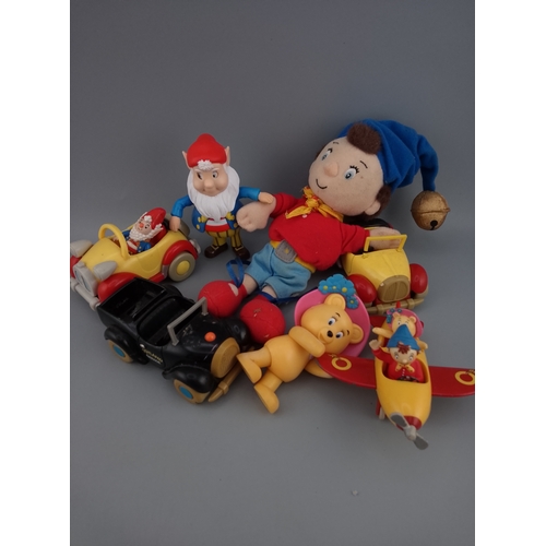 148 - A collection of vintage Noddy characters and vehicles, including plush toys and plastic figures. The... 