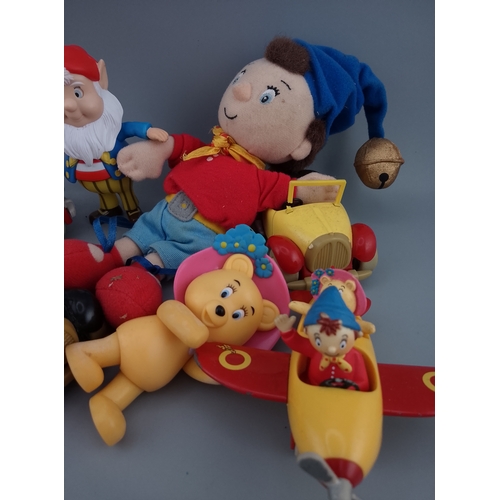 148 - A collection of vintage Noddy characters and vehicles, including plush toys and plastic figures. The... 