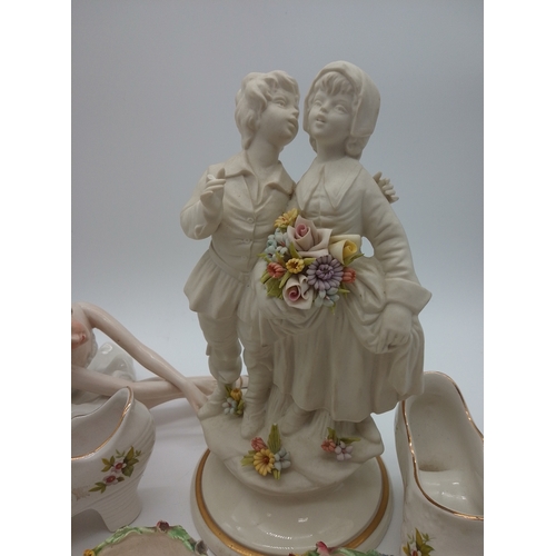 4 - A collection of Italian Figures and trinket dishes