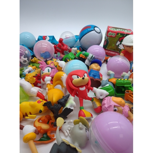 34 - Collection of small toys including Pokémon and Paw Patrol