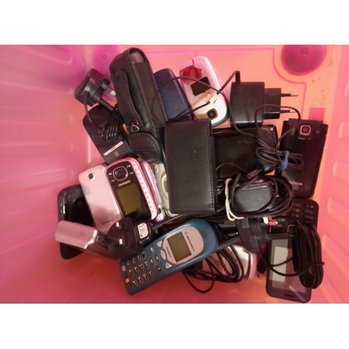 42 - A collection of old mobile phones and accessories.  which can be recycled to recover valuable materi... 