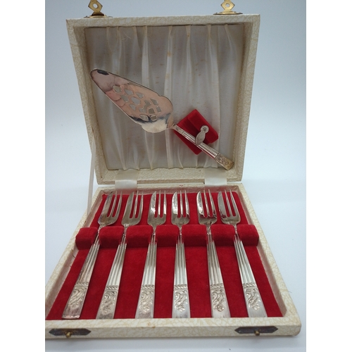 1 - This is a vintage silver-plated dessert set featuring six forks and a coordinating serving piece nes... 
