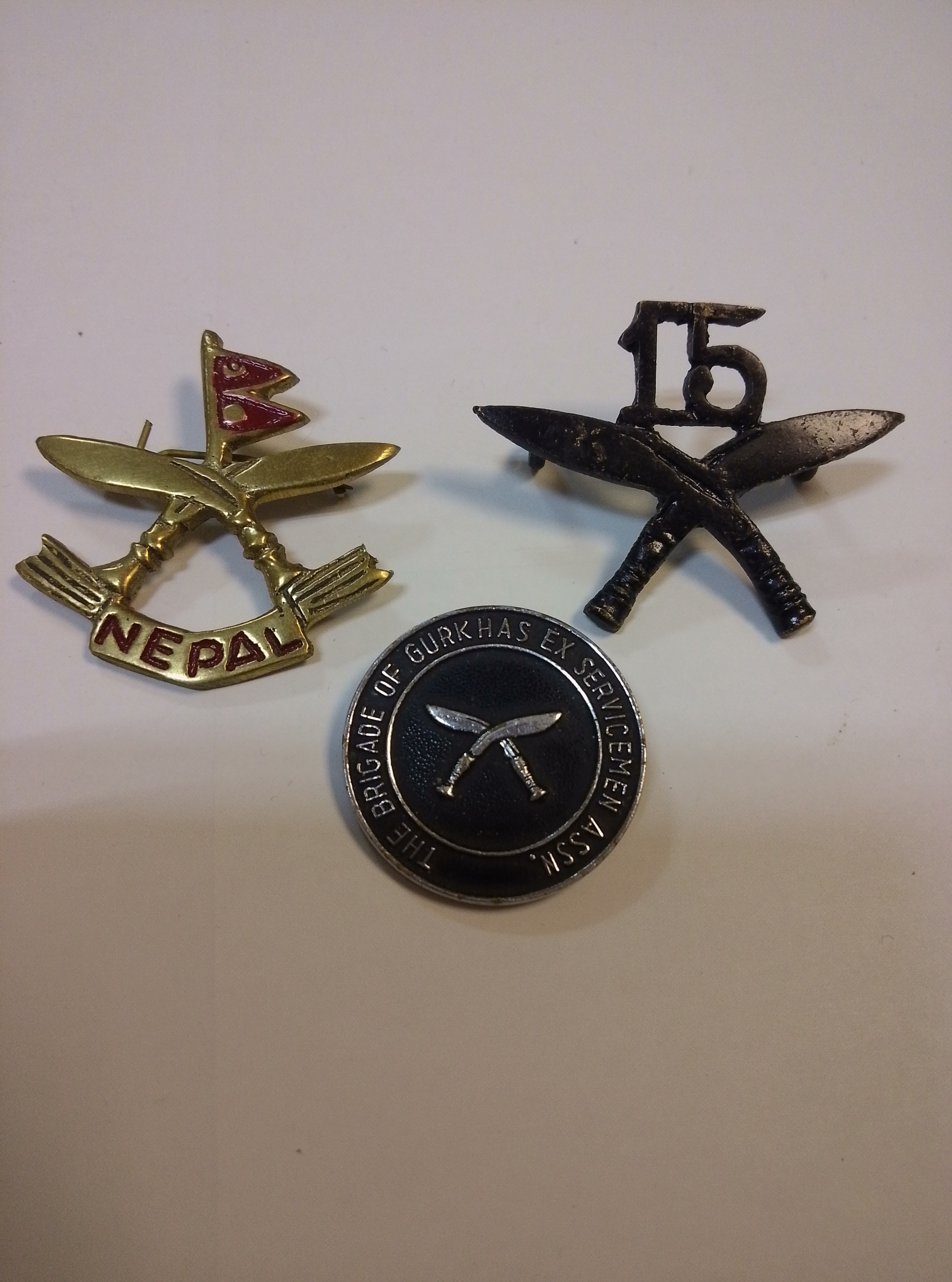 WWII 15th Gerkha rifles cap badge plus other Gurkha interest badges