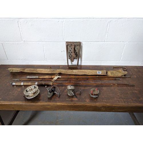 Lots of vintage fishing gear, including rod made by Hardy's England