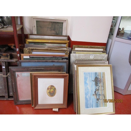 109 - An accumulation of framed pictures and prints