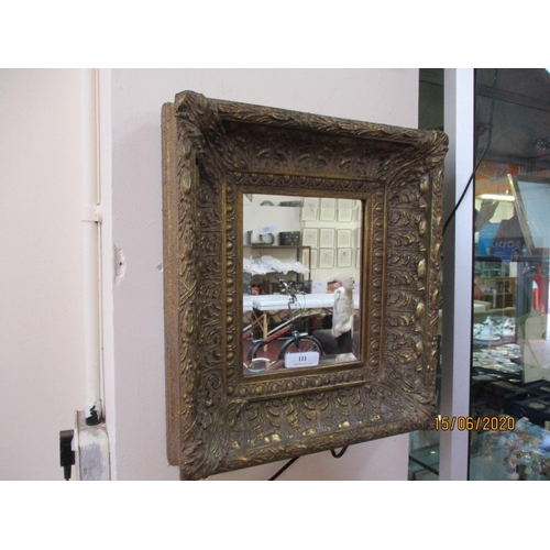 111 - A gilt framed bevelled wall mirror