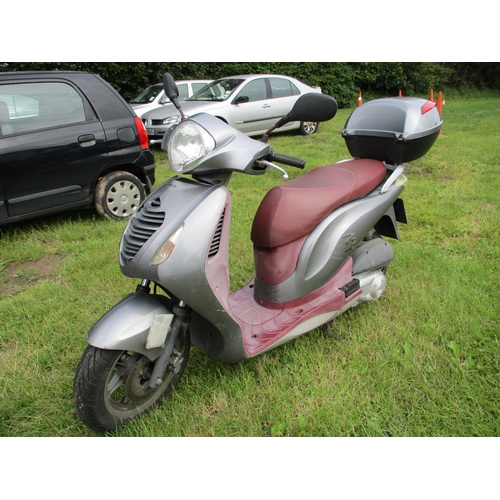 23 - A 2006 Honda PES 125 scooter, J133270, odometer reading 36,713 miles