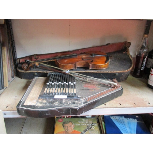 91 - A violin, bow and case together with an autoharp