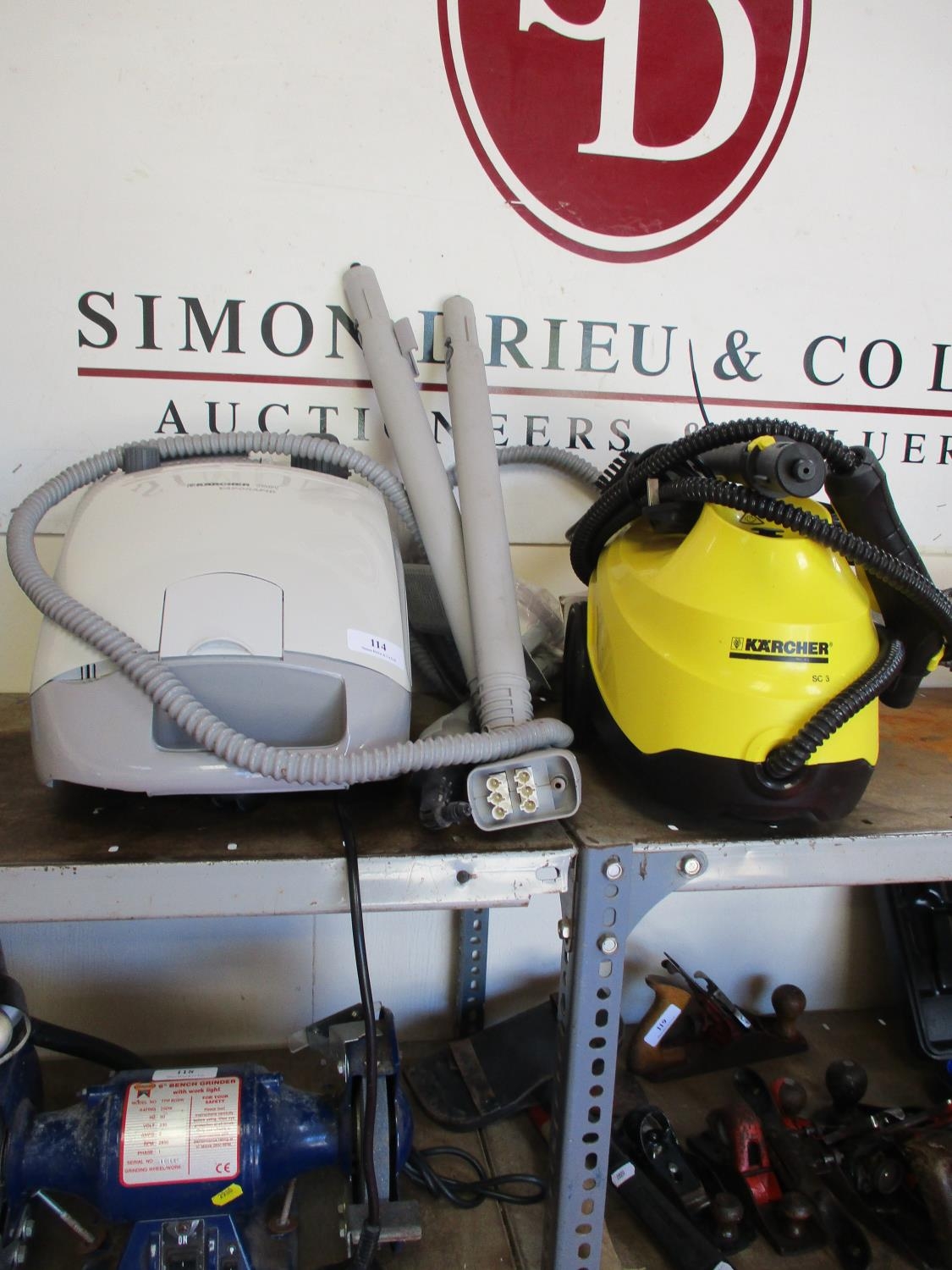 A Karcher SC3 Easyfix steam cleaner together with a Karcher 1501