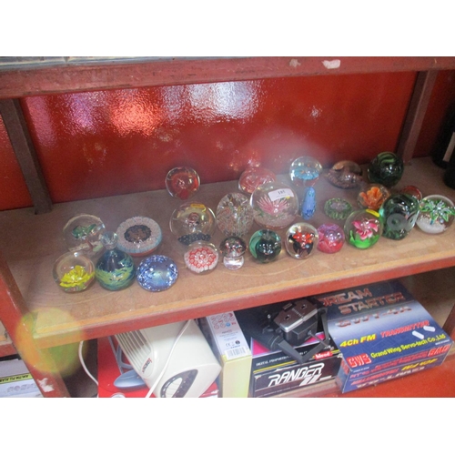 185 - A collection of glass paperweights