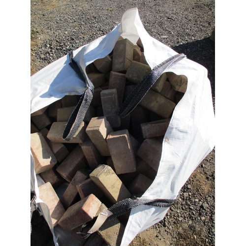 62 - A bulk bag of brick pavers