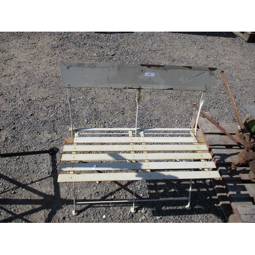 86 - A folding metallic garden bench